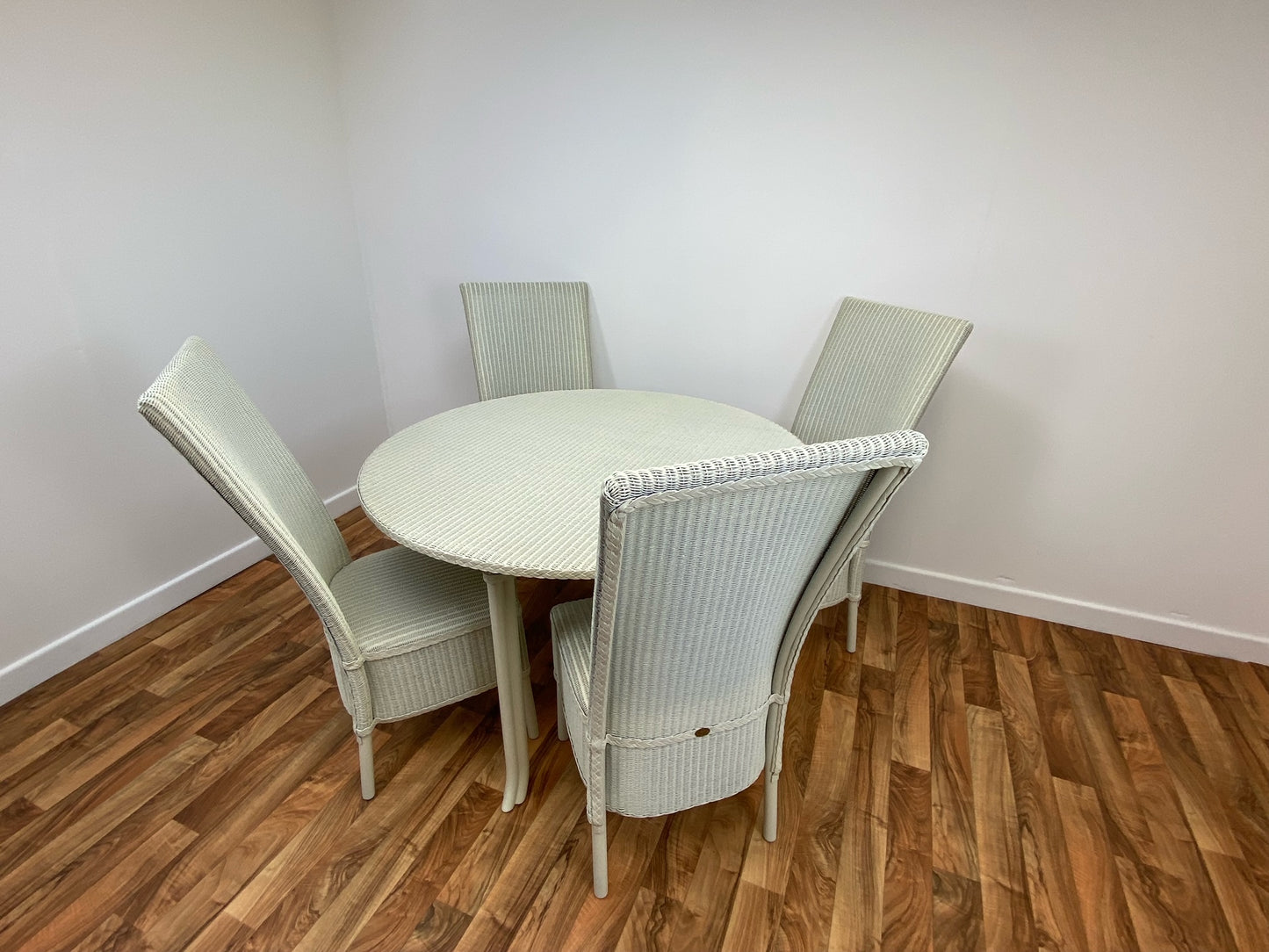 1200mm diameter Stamford table with glass top and 4 x Hadfield dining chairs with skirt